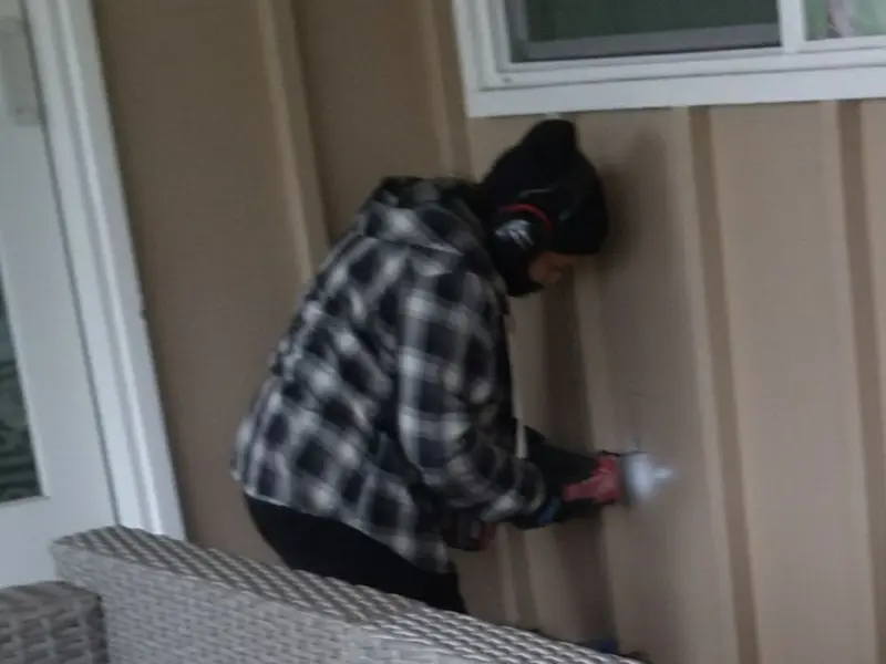Professional electrician installing an exterior outlet in Tell City